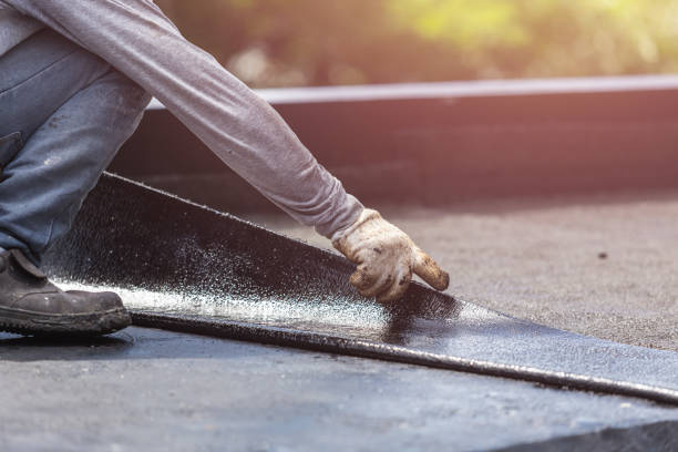 Professional Waterproofing technician working in Barnesville, OH